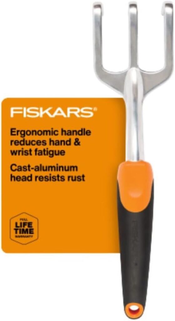 Fiskars Ergo cultivator garden hand fork designed for digging, aerating soil, and removing weeds in home gardens
