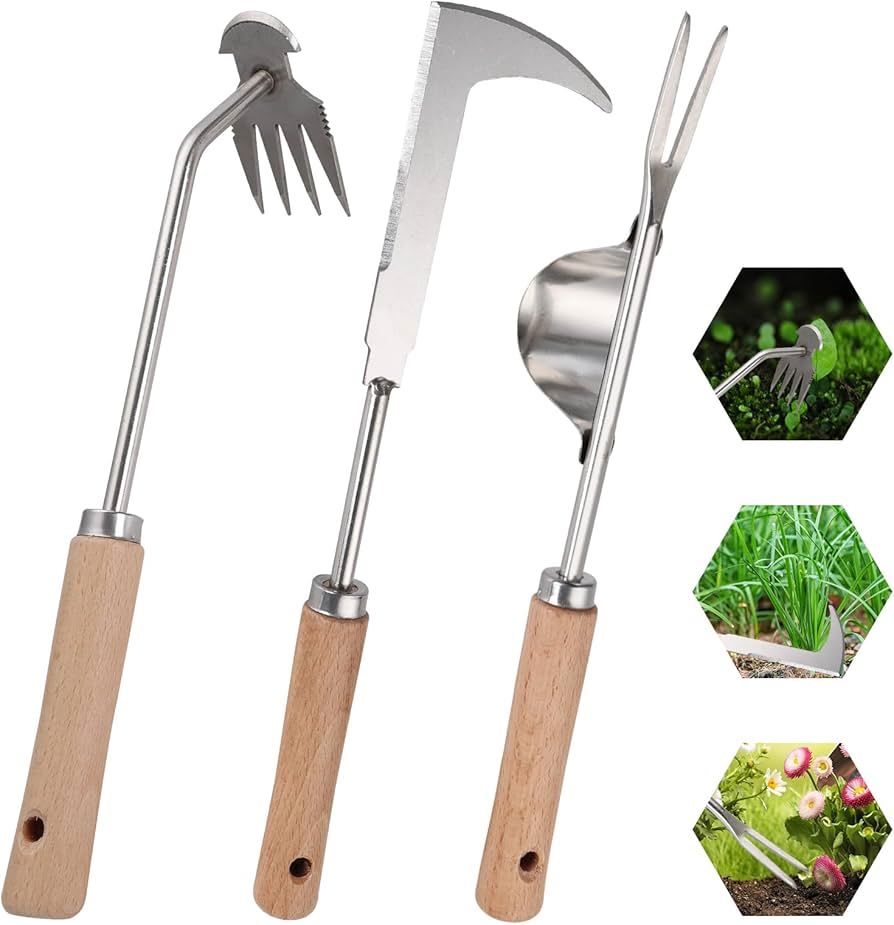 Close-up of garden weeding knife extracting weeds with roots for cleaner soil